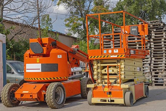 industrial forklift lifting heavy loads in warehouse in Altadena